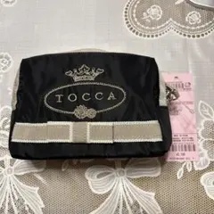 ✨新品✨最終値下げセール❣️TOCCA ブラックポーチ リボン付き　匿名発送❣️のサムネイル