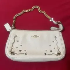 COACH ホワイトレザーポーチ 装飾付き