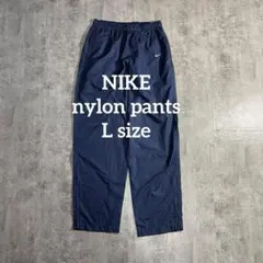 未使用級 NIKE ソロ スウッシュ トラックパンツ L ネイビー ナイロン