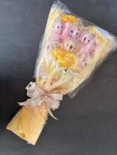 빅 베어 번들 플러시 장난감 부케는 꽃다발처럼 보입니다.