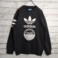 adidasアディダス トレフォイルロゴ プリント ジップ スウェット ブラック