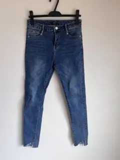 オズモーシスのクラッシュ加工スキニーデニムのサムネイル