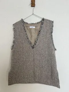 Discoat Vネック ベスト フリンジ付き