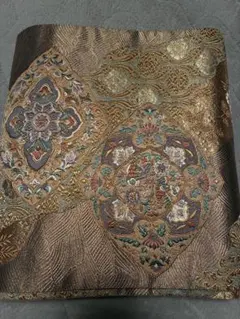 金色と青色の模様 袋帯