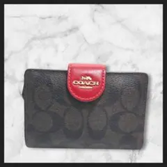 COACH ミディアム コーナー ジップ ウォレット シグネチャー キャンバス