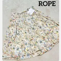 ☆675a.新品未使用　ロペ　総柄スカート　花柄　M フレア ひざ丈　光沢