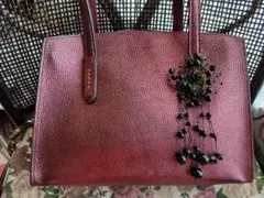 黒い花のバッグチャーム