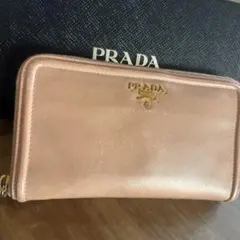 PRADA プラダ 長財布 ゴールド 全体的にダメージ有 - メルカリ