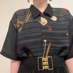 ブラック系 アート柄 レトロ オーバーサイズ 柄シャツ 古着 半袖 透け感のサムネイル
