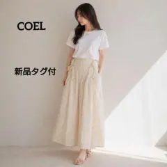新品タグ付 COEL 小花柄ジャガードリボンスカート オフホワイト 38サイズのサムネイル