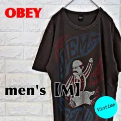 y527【OBEY】プリントTシャツ【メンズM】ダークブラウンのサムネイル