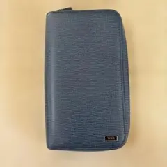 【新品未使用】TUMI 長財布 ラウンドファスナー ネイビーのサムネイル