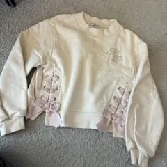 メゾピアノ　mezzo piano リボン付きサイドレースアップトレーナー