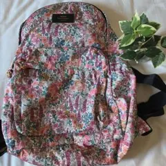 COACH ウルフ花柄リュック - メルカリ