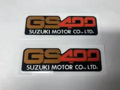 スズキ GS400E サイドカバーエンブレム　　2枚 新品 スズキ GS400E サイドカバーエンブレム 2枚 B級品 2025年