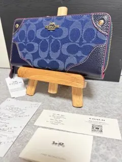 正規品COACH ネイビー シグネチャーデニム長財布 サイドレザーパッドラウンド