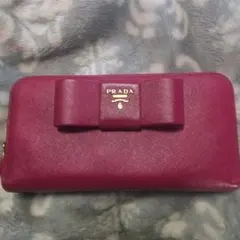 PRADA サフィアーノラウンドファスナー 長財布 リボン付き