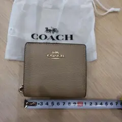 新品未使用！COACH ベージュ系 二つ折り財布