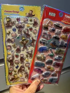 おさるのジョージ トミカ プチドロップステッカー 2種セットのサムネイル