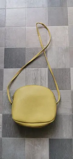 イエロー 円形 ショルダーバッグ