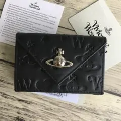 （箱付き）新品未使用 ヴィヴィアン・ウエストウッド 財布 三つ折財布 黒 レザー Amazon | [ヴィヴィアンウエストウッド] 三つ折り財布 エマ