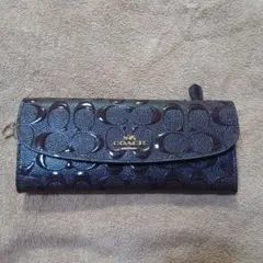 COACH シグネチャー エナメル 長財布 ダークブラウン「訳あり」