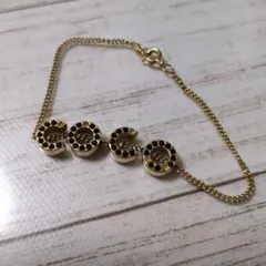 CHANEL COCO ロゴ ブレスレット ゴールド ブラックストーン付きのサムネイル