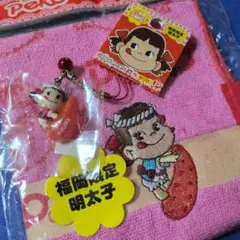 ペコちゃん福岡限定ミニタオルと明太子ペコちゃんストラップ