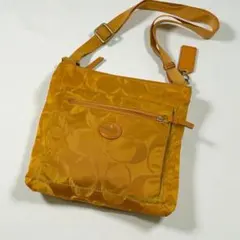 コーチ ショルダーバッグ サコッシュ キャンバス シグネチャー イエロー