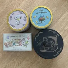 スヌーピー デザイン とダッフィ空き缶セット