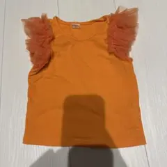 オレンジ フリル付き Tシャツ