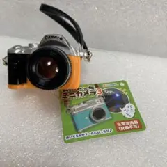 カメラ　ミニカメラ　オレンジ　フラッシュ　音がなる