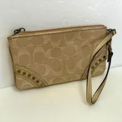 COACH コーチ リストレット ポーチ シグネチャー スタッズ ゴールド