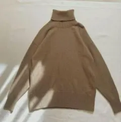 ステイトマインドオーバーサイズ ベージュタートルネックニット