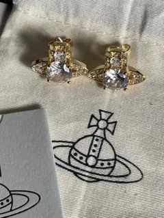 Vivienne Westwood 宇宙船とハート型のシルバーピアス - メルカリ