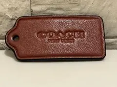 COACH ブラウンレザー ロゴタグ