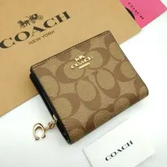 新品　COACH　折り財布　2つ折り財布　レディース　人気の小銭入れ付き