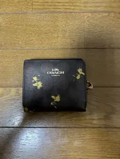 COACH スヌーピー柄 二つ折り財布のサムネイル