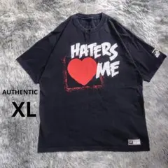 《US古着》AUTHENTIC WEAR 両面プリントTシャツ XLサイズ 黒色のサムネイル