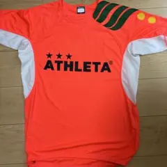 ATHLETA オレンジ 長袖シャツ