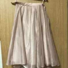 膝下丈のマイストラーダのくすみピンクなフレアスカート