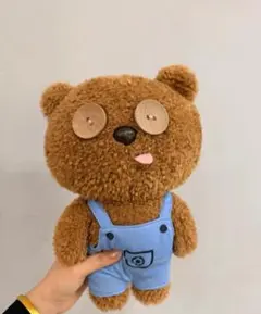 茶色のクマ型ぬいぐるみ