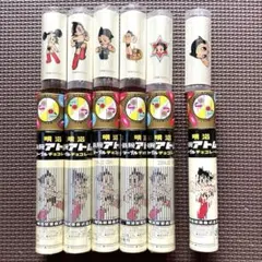 明治 鉄腕アトムマーブルチョコレートの空筒6点とおまけのシール6点のセット