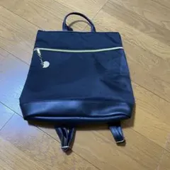 黒いリュック・バックパック 猫チャーム付き