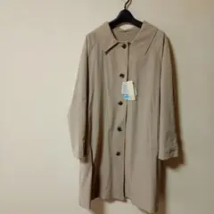 ベージュ ボタン付きコート
