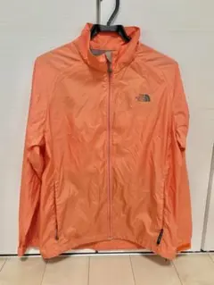 The North Face オレンジ ウィンドブレーカー