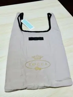 新品未使用『TOCCAトッカ』 エコバッグ ゴールドカラーのロゴ刺繍　ベージュ