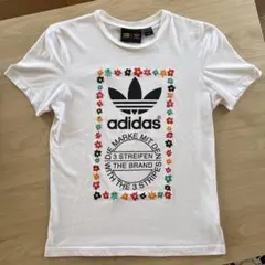 アディダスオリジナル　Tシャツ　コラボtシャツ　花柄始終　カラフル　Mサイズのサムネイル