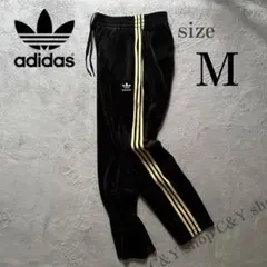 Mサイズ 新品 adidas adidas ベロア トラックパンツ 黒 金
