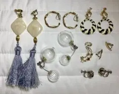 Earrings and one ear cuff, a total of 7 pieces.
